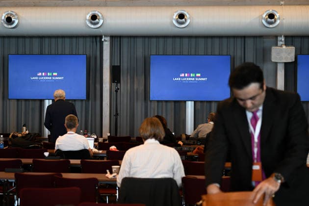 (260622) -- BEIJING, June 22, 2026 -- Reporters work at the press center in Buergenstock near Lucerne, Switzerland, June 21, 2026. Technical-level talks between the United States and Iran under the Islamabad Memorandum of Understanding (MoU) is held here on Sunday. ) XINHUA PHOTOS OF THE DAY LianxYi 