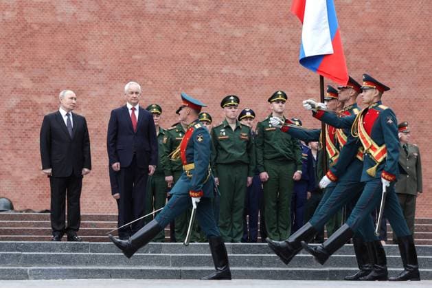 Russia Putin WWII Memory and Sorrow Day 9193361 22.06.2026 Russian President Vladimir Putin and Defence Minister Andrei Belousov, second left, attend a wreath-laying ceremony at the Tomb of the Unknown Soldier by the Kremlin wall on the Day of Memory and Sorrow, marking the 85th anniversary of the Nazi German invasion of the Soviet Union during the World War Two, in Moscow, Russia. Gavriil Grigorov Sputnik Moscow Russia  Copyright: xGavriilxGrigorovx