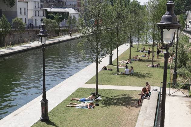 SWIMMING IN THE CANAL SAINT MARTIN PHOTOPQR LE PARISIEN LP Philippe Lavieille Staff PARIS 06 22 2026 Credit  Copyright: xPHOTOPQR LExPARISIEN MAXPPPxx 20260622LPA2841 20260622LPA2841