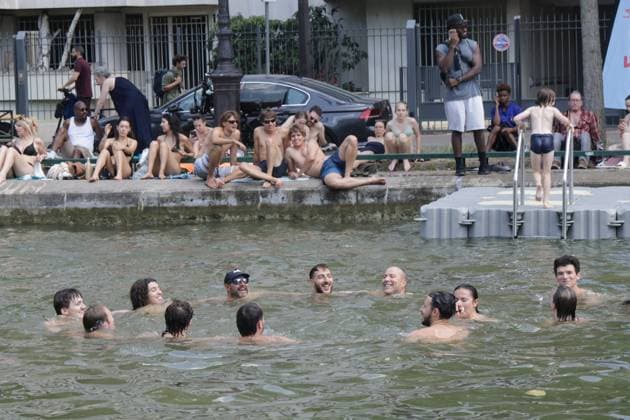 SWIMMING IN THE CANAL SAINT MARTIN PHOTOPQR LE PARISIEN LP Philippe Lavieille Staff PARIS 06 22 2026 Credit  Copyright: xPHOTOPQR LExPARISIEN MAXPPPxx 20260622LPA3348 20260622LPA3348