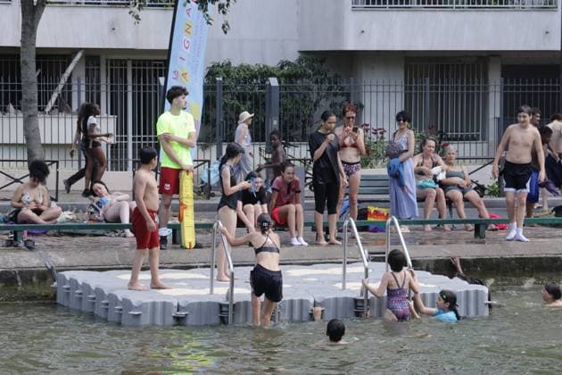 SWIMMING IN THE CANAL SAINT MARTIN PHOTOPQR LE PARISIEN LP Philippe Lavieille Staff PARIS 06 22 2026 Credit  Copyright: xPHOTOPQR LExPARISIEN MAXPPPxx 20260622LPA3349 20260622LPA3349