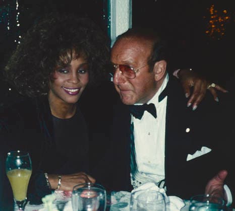 Whitney Houston and Clive Davis attend Arista AIDS Party at Tavern on the Green in New York City on March 17, 1990. Photo Copyright: xHenryxMcGee MediaPunchx