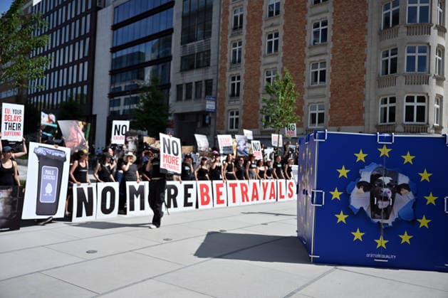 Animal rights activists demonstrate near EU Commission in Brussels for Welfare Reform BRUSSELS, BELGIUM - JUNE 22: Animal rights activists hold placards featuring images of farm animals and slogans like Stop Betraying Animals and Citizens and Farm Industry Out of EU Commission during a protest near the European Commission building in Brussels, Belgium on June 22, 2026. The group gathered to demand comprehensive animal welfare reforms and stricter regulations across the European Union. Dursun Aydemir Anadolu Brussels Belgium. Editorial use only. Please get in touch for any other usage.  Copyright: x2026xAnadoluxDursunxAydemirx