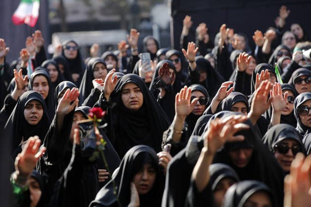 Iranians gather to mark Muharram in Tehran TEHRAN, IRAN - JUNE 22: Shiite Muslims dressed in black wear religious headbands attends a mourning ceremony marking the month of Muharram at the Imamzadeh Ali Akbar Shrine in northern Tehran, Iran on June 22, 2026. Participants gathered to commemorate Hazrat Hussein, the grandson of Prophet Muhammad, and his 72 companions who were martyred in the Battle of Karbala, accompanying the traditional elegies and lamentations. Fatemeh Bahrami Anadolu Tehran Iran. Editorial use only. Please get in touch for any other usage.  Copyright: x2026xAnadoluxFatemehxBahramix