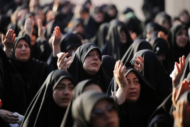 Iranians gather to mark Muharram in Tehran TEHRAN, IRAN - JUNE 22: Shiite Muslims dressed in black wear religious headbands attends a mourning ceremony marking the month of Muharram at the Imamzadeh Ali Akbar Shrine in northern Tehran, Iran on June 22, 2026. Participants gathered to commemorate Hazrat Hussein, the grandson of Prophet Muhammad, and his 72 companions who were martyred in the Battle of Karbala, accompanying the traditional elegies and lamentations. Fatemeh Bahrami Anadolu Tehran Iran. Editorial use only. Please get in touch for any other usage.  Copyright: x2026xAnadoluxFatemehxBahramix