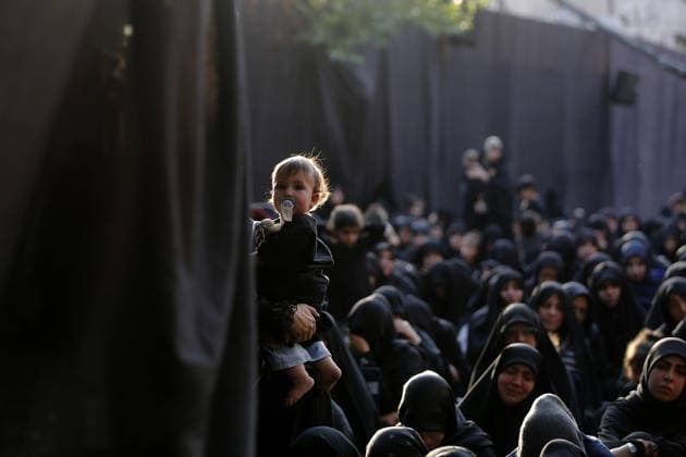 Iranians gather to mark Muharram in Tehran TEHRAN, IRAN - JUNE 22: Shiite Muslims dressed in black wear religious headbands attends a mourning ceremony marking the month of Muharram at the Imamzadeh Ali Akbar Shrine in northern Tehran, Iran on June 22, 2026. Participants gathered to commemorate Hazrat Hussein, the grandson of Prophet Muhammad, and his 72 companions who were martyred in the Battle of Karbala, accompanying the traditional elegies and lamentations. Fatemeh Bahrami Anadolu Tehran Iran. Editorial use only. Please get in touch for any other usage.  Copyright: x2026xAnadoluxFatemehxBahramix