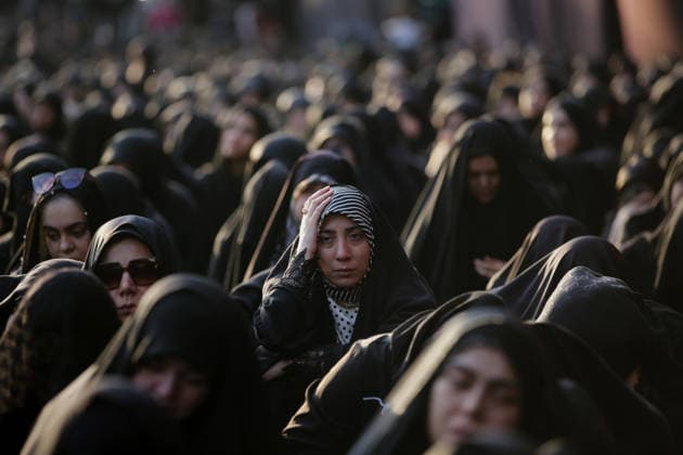 Iranians gather to mark Muharram in Tehran TEHRAN, IRAN - JUNE 22: Shiite Muslims dressed in black wear religious headbands attends a mourning ceremony marking the month of Muharram at the Imamzadeh Ali Akbar Shrine in northern Tehran, Iran on June 22, 2026. Participants gathered to commemorate Hazrat Hussein, the grandson of Prophet Muhammad, and his 72 companions who were martyred in the Battle of Karbala, accompanying the traditional elegies and lamentations. Fatemeh Bahrami Anadolu Tehran Iran. Editorial use only. Please get in touch for any other usage.  Copyright: x2026xAnadoluxFatemehxBahramix