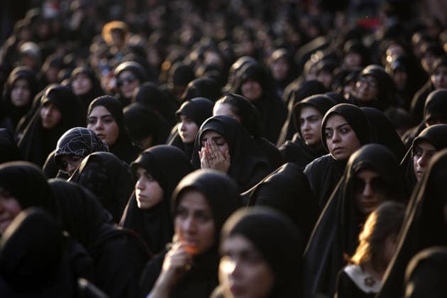 Iranians gather to mark Muharram in Tehran TEHRAN, IRAN - JUNE 22: Shiite Muslims dressed in black wear religious headbands attends a mourning ceremony marking the month of Muharram at the Imamzadeh Ali Akbar Shrine in northern Tehran, Iran on June 22, 2026. Participants gathered to commemorate Hazrat Hussein, the grandson of Prophet Muhammad, and his 72 companions who were martyred in the Battle of Karbala, accompanying the traditional elegies and lamentations. Fatemeh Bahrami Anadolu Tehran Iran. Editorial use only. Please get in touch for any other usage.  Copyright: x2026xAnadoluxFatemehxBahramix