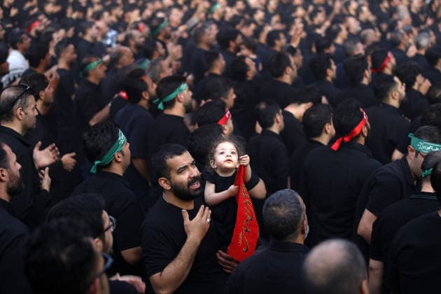 Iranians gather to mark Muharram in Tehran TEHRAN, IRAN - JUNE 22: Shiite Muslims dressed in black wear religious headbands attends a mourning ceremony marking the month of Muharram at the Imamzadeh Ali Akbar Shrine in northern Tehran, Iran on June 22, 2026. Participants gathered to commemorate Hazrat Hussein, the grandson of Prophet Muhammad, and his 72 companions who were martyred in the Battle of Karbala, accompanying the traditional elegies and lamentations. Fatemeh Bahrami Anadolu Tehran Iran. Editorial use only. Please get in touch for any other usage.  Copyright: x2026xAnadoluxFatemehxBahramix