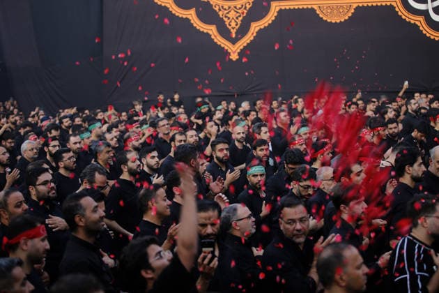 Iranians gather to mark Muharram in Tehran TEHRAN, IRAN - JUNE 22: Shiite Muslims dressed in black wear religious headbands attends a mourning ceremony marking the month of Muharram at the Imamzadeh Ali Akbar Shrine in northern Tehran, Iran on June 22, 2026. Participants gathered to commemorate Hazrat Hussein, the grandson of Prophet Muhammad, and his 72 companions who were martyred in the Battle of Karbala, accompanying the traditional elegies and lamentations. Fatemeh Bahrami Anadolu Tehran Iran. Editorial use only. Please get in touch for any other usage.  Copyright: x2026xAnadoluxFatemehxBahramix