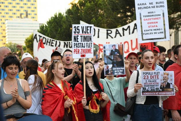 Protests against the tourism project in Albania, continue for 23rd consecutive day TIRANA, ALBANIA - JUNE 22: Hundreds of demonstrators march along the National Martyrs Boulevard toward the Prime Ministry building on the 23rd consecutive day of protests in Tirana, Albania, on June 22, 2026. Gathering at Skanderbeg Square under the slogan Albania is not for sale , the crowds expressed fierce opposition to a multi-million dollar luxury tourism development project planned for the protected Zvernec region in the coastal city of Vlora. The controversial project is allegedly linked to Jared Kushner and Ivanka Trump, the son-in-law and daughter of U.S. President Donald Trump, involving the privatization of pristine public coastlines. The demonstr  Copyright: x2026xAnadoluxOlsixShehux