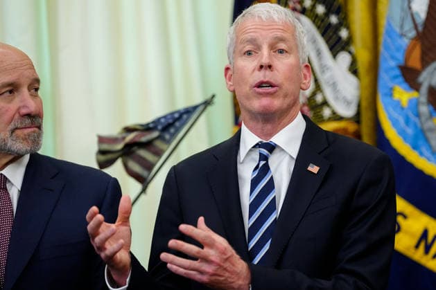 Howard Lutnick, US commerce secretary, left, and Chris Wright, US energy secretary, during an executive order signing in the Oval Office of the White House in Washington, DC, US, on Monday, June 22, 2026. President Trump signed executive orders Monday aimed at accelerating quantum research, laying the groundwork for federal agencies to adopt the technology and strengthen US defenses against cyberattacks.  WASp2025062216 BonniexCash