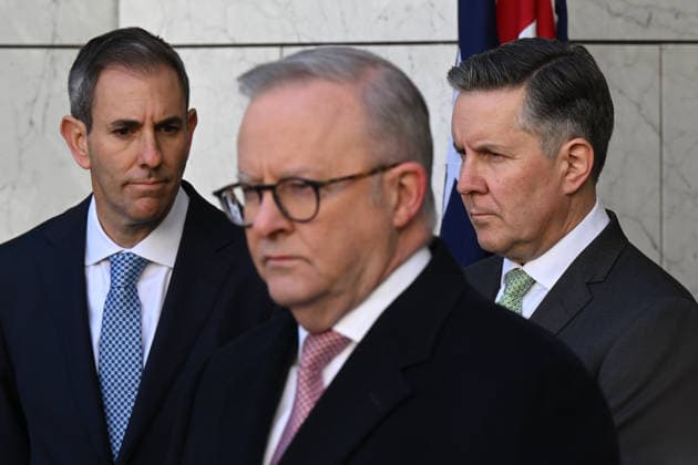ANTHONY ALBANESE TAX PRESSER, Australian Treasurer Jim Chalmers and Australian Health Minister Mark Butler listen to Australian Prime Minister Anthony Albanese speak to the media during a press conference at Parliament House in Canberra, Tuesday, June 23, 2026. ( NO ARCHIVING CANBERRA ACT AUSTRALIA  Copyright: xLUKASxCOCHx 20260623173137717926