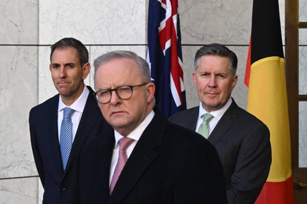 ANTHONY ALBANESE TAX PRESSER, Australian Treasurer Jim Chalmers and Australian Health Minister Mark Butler listen to Australian Prime Minister Anthony Albanese speak to the media during a press conference at Parliament House in Canberra, Tuesday, June 23, 2026. ( NO ARCHIVING CANBERRA ACT AUSTRALIA  Copyright: xLUKASxCOCHx 20260623165683158359