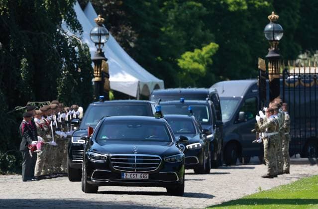 Japan emperor, empress in Brussels A motorcade carrying Japanese Emperor Naruhito and Empress Masako arrives at the Palace of Laeken in Brussels on June 22, 2026. (Pool photo)  A14AA0005619846P