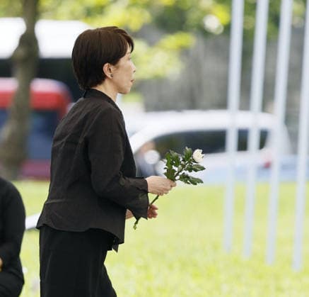 81st anniversary of WWII ground battle in Okinawa Japanese Prime Minister Sanae Takaichi lays flowers during a ceremony marking the 81st anniversary of the end of the Battle of Okinawa in World War II, at the Peace Memorial Park in Itoman, Okinawa Prefecture, southern Japan, on June 23, 2026.  A14AA0005619902P