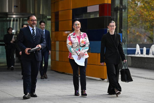 ROBODEBT COMPENSATION, Andrew Grech, partner of Gordon Legal (left) and Felicity Button (centre) arrive to speak to media outside of the Federal Court in Melbourne, Tuesday, June 23, 2026. ( NO ARCHIVING Melbourne Victoria AUSTRALIA  Copyright: xx 20260623138430459624
