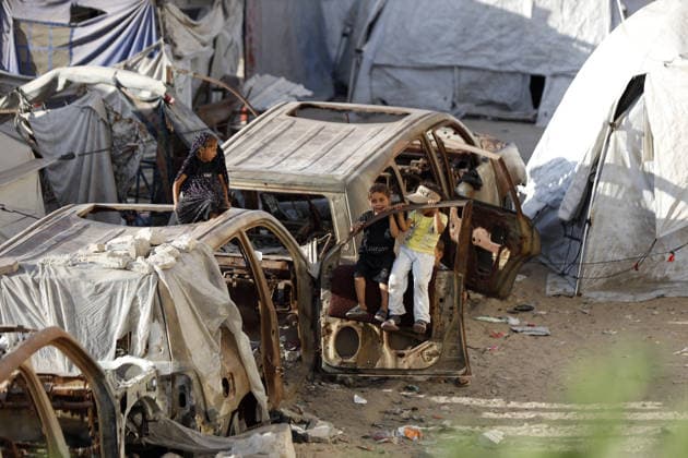 Palestinians displaced by Israeli attacks struggling to survive in makeshift tents GAZA CITY, GAZA, PALESTINE - JUNE 22: Displaced Palestinian families try to sustain their lives with severely limited resources inside an overcrowded makeshift tent camp set up along the Mediterranean coastline of Gaza City, Gaza, Palestine on June 22, 2026. Following more than two years of an intense military blockade and devastating bombardments by Israeli forces, hundreds of thousands of civilians have been forced to flee their homes, finding refuge only in fragile tents or heavily damaged structures. The ongoing conflict has triggered a catastrophic humanitarian crisis, leaving the displaced population struggling daily to access basic necessities such as  Copyright: x2026xAnadoluxAhmedxJihadxIbrahimxAl-arinix