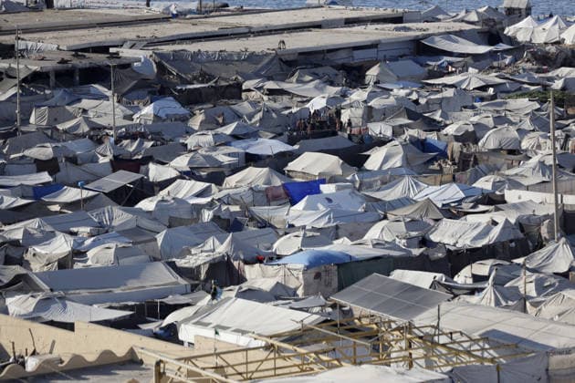 Palestinians displaced by Israeli attacks struggling to survive in makeshift tents GAZA CITY, GAZA, PALESTINE - JUNE 22: Displaced Palestinian families try to sustain their lives with severely limited resources inside an overcrowded makeshift tent camp set up along the Mediterranean coastline of Gaza City, Gaza, Palestine on June 22, 2026. Following more than two years of an intense military blockade and devastating bombardments by Israeli forces, hundreds of thousands of civilians have been forced to flee their homes, finding refuge only in fragile tents or heavily damaged structures. The ongoing conflict has triggered a catastrophic humanitarian crisis, leaving the displaced population struggling daily to access basic necessities such as  Copyright: x2026xAnadoluxAhmedxJihadxIbrahimxAl-arinix