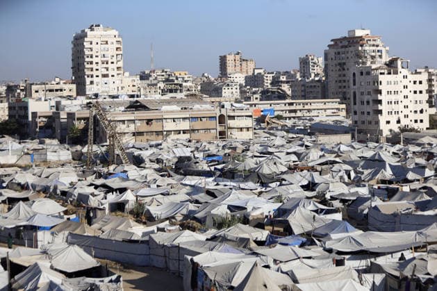 Palestinians displaced by Israeli attacks struggling to survive in makeshift tents GAZA CITY, GAZA, PALESTINE - JUNE 22: Displaced Palestinian families try to sustain their lives with severely limited resources inside an overcrowded makeshift tent camp set up along the Mediterranean coastline of Gaza City, Gaza, Palestine on June 22, 2026. Following more than two years of an intense military blockade and devastating bombardments by Israeli forces, hundreds of thousands of civilians have been forced to flee their homes, finding refuge only in fragile tents or heavily damaged structures. The ongoing conflict has triggered a catastrophic humanitarian crisis, leaving the displaced population struggling daily to access basic necessities such as  Copyright: x2026xAnadoluxAhmedxJihadxIbrahimxAl-arinix