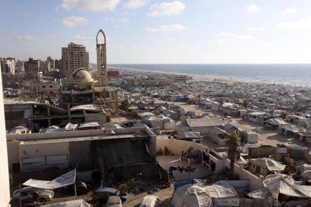 Palestinians displaced by Israeli attacks struggling to survive in makeshift tents GAZA CITY, GAZA, PALESTINE - JUNE 22: Displaced Palestinian families try to sustain their lives with severely limited resources inside an overcrowded makeshift tent camp set up along the Mediterranean coastline of Gaza City, Gaza, Palestine on June 22, 2026. Following more than two years of an intense military blockade and devastating bombardments by Israeli forces, hundreds of thousands of civilians have been forced to flee their homes, finding refuge only in fragile tents or heavily damaged structures. The ongoing conflict has triggered a catastrophic humanitarian crisis, leaving the displaced population struggling daily to access basic necessities such as  Copyright: x2026xAnadoluxAhmedxJihadxIbrahimxAl-arinix