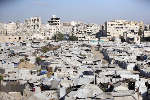 Palestinians displaced by Israeli attacks struggling to survive in makeshift tents GAZA CITY, GAZA, PALESTINE - JUNE 22: Displaced Palestinian families try to sustain their lives with severely limited resources inside an overcrowded makeshift tent camp set up along the Mediterranean coastline of Gaza City, Gaza, Palestine on June 22, 2026. Following more than two years of an intense military blockade and devastating bombardments by Israeli forces, hundreds of thousands of civilians have been forced to flee their homes, finding refuge only in fragile tents or heavily damaged structures. The ongoing conflict has triggered a catastrophic humanitarian crisis, leaving the displaced population struggling daily to access basic necessities such as  Copyright: x2026xAnadoluxAhmedxJihadxIbrahimxAl-arinix