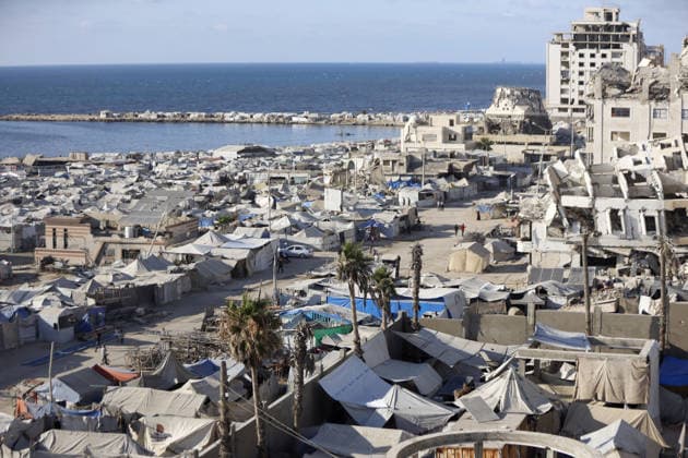 Palestinians displaced by Israeli attacks struggling to survive in makeshift tents GAZA CITY, GAZA, PALESTINE - JUNE 22: Displaced Palestinian families try to sustain their lives with severely limited resources inside an overcrowded makeshift tent camp set up along the Mediterranean coastline of Gaza City, Gaza, Palestine on June 22, 2026. Following more than two years of an intense military blockade and devastating bombardments by Israeli forces, hundreds of thousands of civilians have been forced to flee their homes, finding refuge only in fragile tents or heavily damaged structures. The ongoing conflict has triggered a catastrophic humanitarian crisis, leaving the displaced population struggling daily to access basic necessities such as  Copyright: x2026xAnadoluxAhmedxJihadxIbrahimxAl-arinix