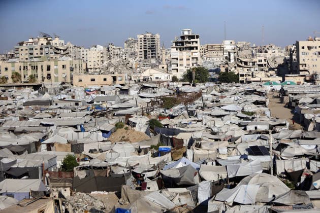 Palestinians displaced by Israeli attacks struggling to survive in makeshift tents GAZA CITY, GAZA, PALESTINE - JUNE 22: Displaced Palestinian families try to sustain their lives with severely limited resources inside an overcrowded makeshift tent camp set up along the Mediterranean coastline of Gaza City, Gaza, Palestine on June 22, 2026. Following more than two years of an intense military blockade and devastating bombardments by Israeli forces, hundreds of thousands of civilians have been forced to flee their homes, finding refuge only in fragile tents or heavily damaged structures. The ongoing conflict has triggered a catastrophic humanitarian crisis, leaving the displaced population struggling daily to access basic necessities such as  Copyright: x2026xAnadoluxAhmedxJihadxIbrahimxAl-arinix