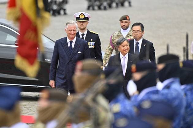King Philippe - Filip of Belgium and Japanese Emperor Naruhito follow pass by soldiers at the official welcoming ceremony at the Place des Palais Paleizenplein, in Brussels, during the official state visit of the Japanese Emperor and Empress to Belgium on Tuesday 23 June 2026. The Emperor and Empress of Japan visit Belgium from June 20-25.  ERICxLALMAND 178910531