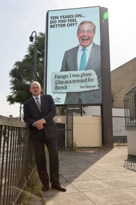 June 23, 2026, London, London, UK: London, UK. Liberal Democrat leader Ed Davey poses in front of a digital billboard in Fulham, London, during the launch of the Liberal Democrats new national campaign targeting Reform UK leader Nigel Farage and highlighting a Â£5 million gift he received, as the party marks the 10th anniversary of the Brexit referendum. London UK  - ZUMAl94_ 20260623_zaf_l94_034 Copyright: xDinendraxHariax