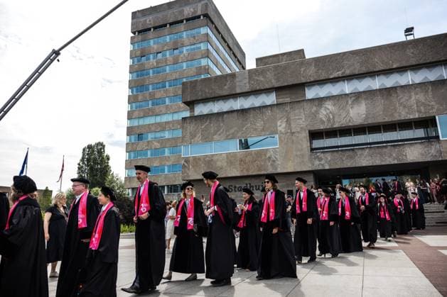 EINDHOVEN - A procession of professors in classical gowns walks through the city from City Hall Square to the university campus during the kickoff of the Eindhoven University of Technology s anniversary year. TU e is celebrating its 70th anniversary. ROB ENGELAAR ANP netherlands out - belgium out  Copyright: xx x561737994x originalFilename: 561737994.jpg