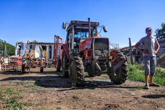 RECORD DATE NOT STATED Agricultural machinery damaged by a Russian missile strike is seen on the grounds of an agricultural enterprise in Odesa region, Ukraine, on June 21, 2026. Late on June 21, Russian forces launched an Iskander ballistic missile strike on a civilian agricultural enterprise, completely destroying a warehouse building and damaging the facade of a two-story building and agricultural machinery. One person was killed and three others were injured and hospitalized (Photo by Nina Liashonok Ukrinform) Agricultural enterprise hit by Russian strike in Odesa region  Copyright: xNinaxLiashonokx
