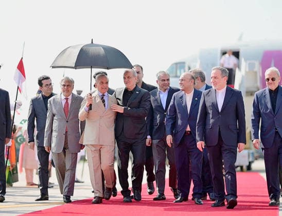 (260623) -- ISLAMABAD, June 23, 2026 -- Pakistani Prime Minister Shehbaz Sharif and Pakistani President Asif Ali Zardari welcome Iranian President Masoud Pezeshkian at Nur Khan airbase in Rawalpindi, Pakistan, June 23, 2026. TO GO WITH Iranian president arrives in Pakistan amid ongoing peace efforts ( Handout via Xinhua) PAKISTAN-RAWALPINDI-IRAN-PRESIDENT-ARRIVAL PrimexMinister sxOfficexofxPakistan 