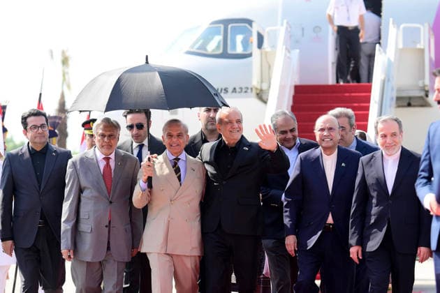 (260623) -- ISLAMABAD, June 23, 2026 -- Pakistani Prime Minister Shehbaz Sharif and Pakistani President Asif Ali Zardari welcome Iranian President Masoud Pezeshkian at Nur Khan airbase in Rawalpindi, Pakistan, June 23, 2026. TO GO WITH Iranian president arrives in Pakistan amid ongoing peace efforts ( Handout via Xinhua) PAKISTAN-RAWALPINDI-IRAN-PRESIDENT-ARRIVAL PrimexMinister sxOfficexofxPakistan 