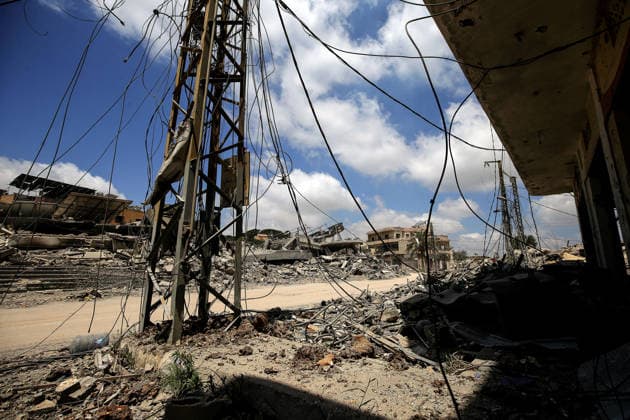 June 23, 2026, Mayfadoun, Mayfadoun, Lebanon: Destroyed building, twisted metal and tangled electricity cables caused by Israeli air strikes litterl an area in the devastated southern Lebanese village of Mayfadoun. Scores of Lebanese who fled their villages started to return to face a devastating shock of finding their homes completely demolished. Following the recent US-Iran deal, residents have attempted to return, only to be met with scenes of rubble and ash. Mayfadoun Lebanon  - ZUMAn313 20260623_zip_n313_003 Copyright: xMarwanxNaamanix