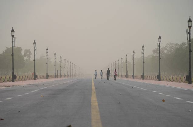 People walk on Kartavya Path amid dust storm and gusty winds New Delhi, Jun 23 (ANI): People walk on Kartavya Path amid dust storm and gusty winds, in New Delhi on Tuesday. New Delhi Delhi India Copyright: xANIx ANI_20260623332