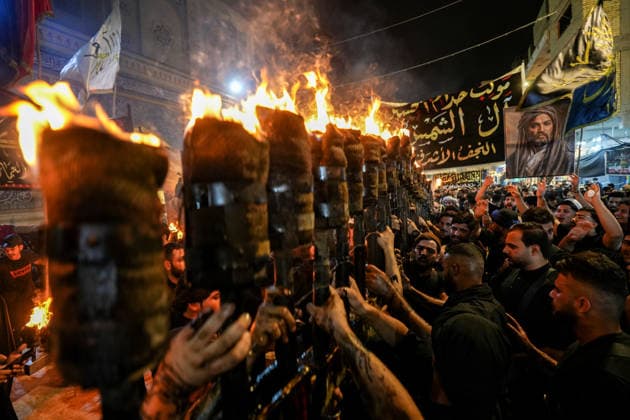 Muharram mourning ceremonies held across Iraq NAJAF, IRAQ - JUNE 23: Pilgrims hold torches as they participate in a mourning ceremony near the Imam Ali Shrine during Muharram events in Najaf, Iraq on June 23, 2026. Participants commemorated Prophet Muhammad s grandson Imam Hussein and his 72 companions, who were martyred in Karbala. Karar Essa Anadolu Najaf Iraq. Editorial use only. Please get in touch for any other usage.  Copyright: x2026xAnadoluxKararxEssax