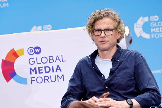 Unternehmer Cyriac Roeding, Investor bei OpenAI, beim Deutsche Welle Global Media Forum 2026 unter dem Motto Journalism out loud im ehemaligen Plenarsaal des Bundestages im World Conference Center Bonn. Die Deutsche Welle ist der Auslandsrundfunk der Bundesrepublik Deutschland. Bonn, 23.06.2026 NRW Deutschland *** Entrepreneur Cyriac Roeding, an investor at OpenAI, at the Deutsche Welle Global Media Forum 2026, themed Journalism out loud, in the former plenary hall of the Bundestag at the World Conference Center Bonn. Deutsche Welle is the international broadcaster of the Federal Republic of Germany. Bonn, June 23, 2026, North Rhine-Westphalia, Germany,detected_source_language Copyright: xChristophxHardtx
