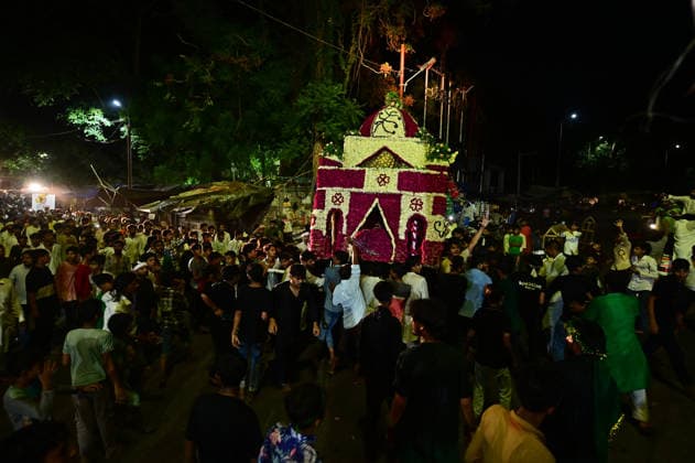 June 24, 2026, Prayagraj, Uttar Pradesh, India: Prayagraj: Muslims take part in a Tajiya procession during ongoing Muharram month, in Prayagraj on Wednesday, June 24, 2026. Prayagraj India  - ZUMAv115 20260624_zap_v115_002 Copyright: xPrabhatxKumarxVermax