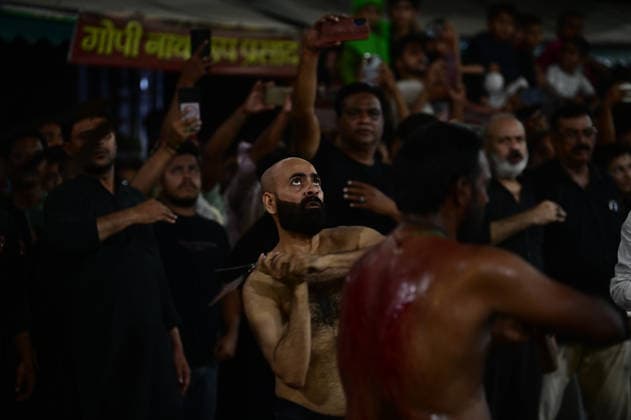 June 23, 2026, Prayagraj, Uttar Pradesh, India: Prayagraj: Shia Muslims take part in a mourning procession on the seventh date of Muharram month, in Prayagraj on Tuesday, June 23, 2026. Prayagraj India  - ZUMAv115 20260623_zap_v115_013 Copyright: xPrabhatxKumarxVermax