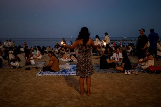 Celebration of the traditional Sant Joan festival in Barcelona Barceloneta Beach during the celebration of the traditional Sant Joan festival, on June 23, 2026, in Barcelona, Catalonia, Spain. This iconic folk festival, characterized by bonfires, firecrackers, and family and neighborhood gatherings to eat the traditional coca, brings together thousands of Barcelonians in the streets, squares, and beaches to celebrate the shortest night of the year and welcome the summer solstice in a festive atmosphere marked by the arrival of the Flame of Canigó. Lorena Sopê BARCELONA SPAIN BARCELONA SPAIN SPAIN,detected_source_language  Copyright: xLorenaxSopÃªnax 7618286