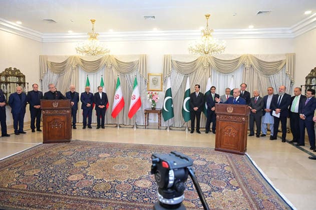 Pakistan s Prime Minister Muhammad Shehbaz Sharif (C-R) speaks during a press conference with Iranian President Dr. Masoud Pezeshkian (C-L) in Islamabad, Pakistan, on Tuesday, June 23, 2026. A high-level Iranian delegation, including President Pezeshkian and Foreign Minister Abbas Araghchi, is visiting Pakistan. The Iranian president praised the progress of negotiations with the United States following the signing of a memorandum of understanding in Switzerland.  PAK2026062322 Pakistan sxPrimexMinisterxOffice