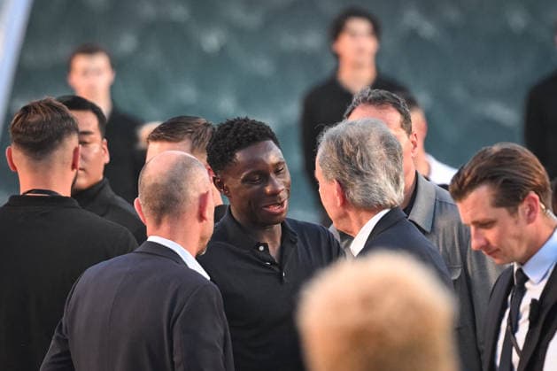 PFW - Louis Vuitton Runway in Paris FA French Tennis player moise kouame talks with LVMH chairman and CEO Bernard Arnault attends the Spring Summer 2027 collection by US designer Pharrell Williams for Louis Vuitton during the Paris Fashion Week, on June 23, 2026. Photo by Firas Abdullah ABACAPRESS.COM Paris Ile-de-France France  Copyright: xAbdullahxFiras ABACAx
