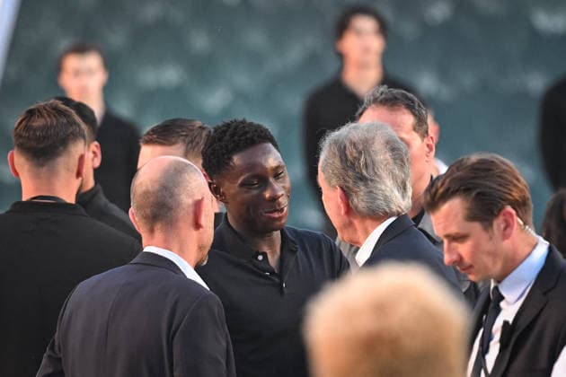 PFW - Louis Vuitton Runway in Paris FA French Tennis player moise kouame talks with LVMH chairman and CEO Bernard Arnault attends the Spring Summer 2027 collection by US designer Pharrell Williams for Louis Vuitton during the Paris Fashion Week, on June 23, 2026. Photo by Firas Abdullah ABACAPRESS.COM Paris Ile-de-France France  Copyright: xAbdullahxFiras ABACAx