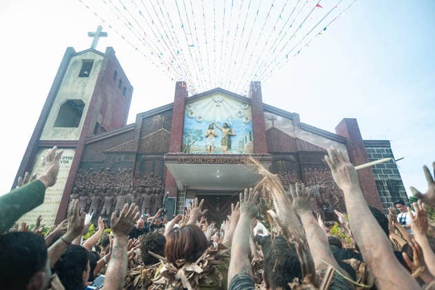 June 24, 2026, Aliaga, Nueva Ecija, Philippines: On June 24, 2026, local devotees of Saint John in the town of Bibiclat, Aliaga in Nueva Ecija, Philippines spread mud on their body and wear dried banana leaves in celeration of the Taong Putik Festival. The festival commemorates their local patron saint and the miracle that happened during the Japanese occupation that saved the locals from execution. Aliaga Philippines  - ZUMAy102 20260624_zip_y102_012 Copyright: xKenosisxYapx