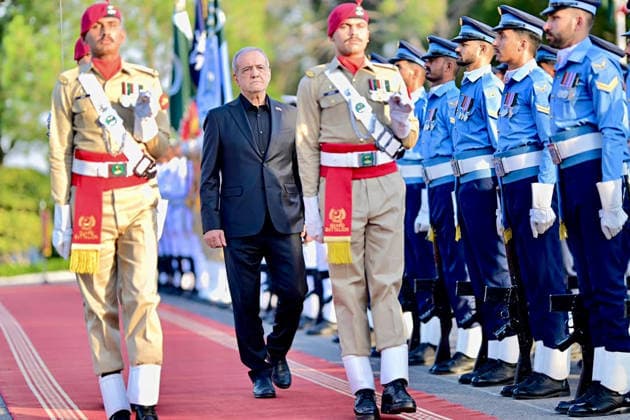 June 23, 2026, Peshawar, Peshawar, Pakistan: Iranian President Masoud Pezeshkian Reviews Honor Guard During Welcome Ceremony in Islamabad..Islamabad, Pakistan, June 23, 2026: Masoud Pezeshkian reviews an honor guard during an official welcome ceremony in Islamabad on June 23, 2026. Pezeshkian is in Pakistan to participate in ongoing diplomatic discussions and U.S.-Iran peace talks hosted by Pakistan. The visit underscores efforts to promote regional dialogue, diplomatic engagement, and international cooperation. Peshawar Pakistan  - ZUMAa217 20260623_znp_a217_032 Copyright: xHussainxAlix