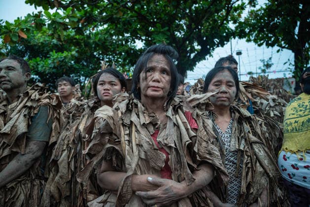 June 24, 2026, Aliaga, Nueva Ecija, Philippines: On June 24, 2026, local devotees of Saint John in the town of Bibiclat, Aliaga in Nueva Ecija, Philippines spread mud on their body and wear dried banana leaves in celeration of the Taong Putik Festival. The festival commemorates their local patron saint and the miracle that happened during the Japanese occupation that saved the locals from execution. Aliaga Philippines  - ZUMAy102 20260624_zip_y102_018 Copyright: xKenosisxYapx