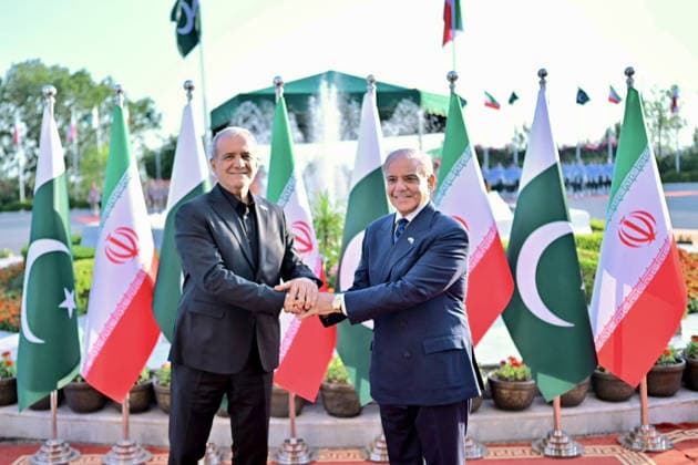 June 23, 2026, Peshawar, Peshawar, Pakistan: Iranian President Masoud Pezeshkian Reviews Honor Guard During Welcome Ceremony in Islamabad..Islamabad, Pakistan, June 23, 2026: Masoud Pezeshkian reviews an honor guard during an official welcome ceremony in Islamabad on June 23, 2026. Pezeshkian is in Pakistan to participate in ongoing diplomatic discussions and U.S.-Iran peace talks hosted by Pakistan. The visit underscores efforts to promote regional dialogue, diplomatic engagement, and international cooperation. Peshawar Pakistan  - ZUMAa217 20260623_znp_a217_034 Copyright: xHussainxAlix