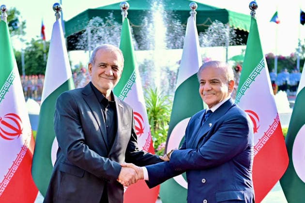 June 23, 2026, Peshawar, Peshawar, Pakistan: Iranian President Masoud Pezeshkian Reviews Honor Guard During Welcome Ceremony in Islamabad..Islamabad, Pakistan, June 23, 2026: Masoud Pezeshkian reviews an honor guard during an official welcome ceremony in Islamabad on June 23, 2026. Pezeshkian is in Pakistan to participate in ongoing diplomatic discussions and U.S.-Iran peace talks hosted by Pakistan. The visit underscores efforts to promote regional dialogue, diplomatic engagement, and international cooperation. Peshawar Pakistan - ZUMAa217 20260623_znp_a217_033 Copyright: xHussainxAlix