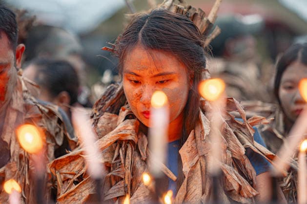 June 24, 2026, Manila, Manila, Philippines: Devotees spread mud on their bodies and put on banana leaves for the mass celebrating Taong Putik Festival in Bibiclat, Aliaga, Nueva Ecija every June 24. The festival honors Saint John the Baptist and honors a miracle during the Second World War, when the execution of Filipino prisoners of war was called off after a sudden downpour. Manila Philippines  - ZUMAs361 20260624_zip_s361_010 Copyright: xJyorxSox